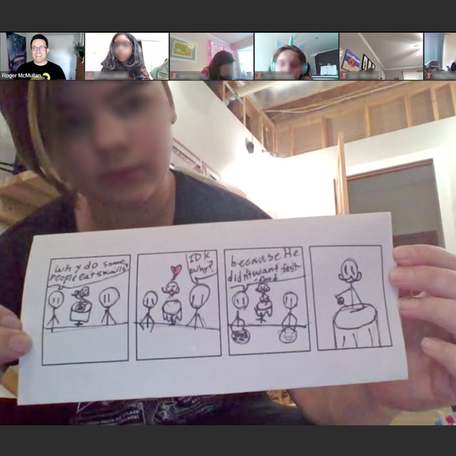 A video call with a child proudly displaying a comic they made