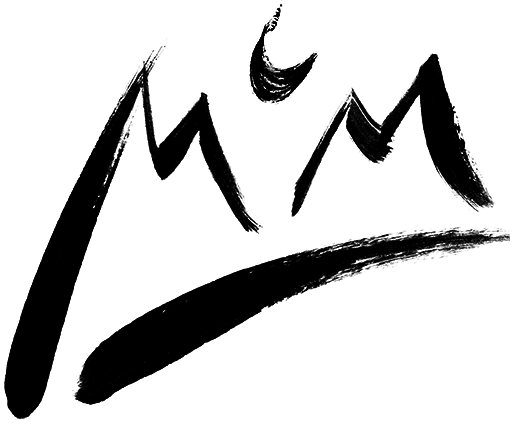 Brush letters form a mountain and moon logo that also spell out "McM"